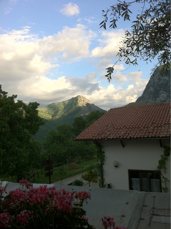 A tiled-roof home beneath the mountains in Abruzzo, Italy